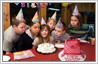 Add 'Happy Birthday' icing plate to birthday party photo