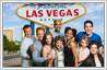 Group photo background has been changed from plain studio backdrop to 'Welcome to Las Vegas' board