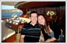 Online photo editor required to change background of photo. The couple in the picture is to be moved to a luxury liner.
