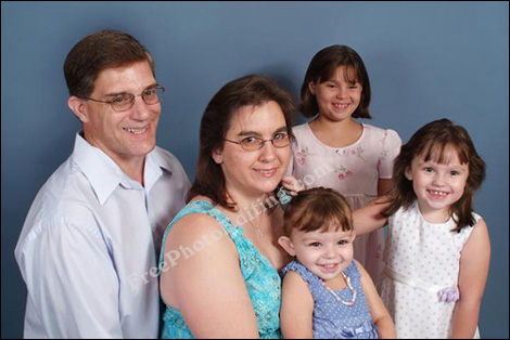 One girl removed from group photograph with the use of photo editing.