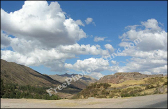 Before photo editing: Beautiful scenery shot -- small hillocks, clouds...