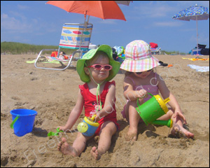 This photos show two kids having a great time at the beach. The boy in the photo on left has to be added to this photo.
