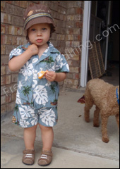 Photo editing required to move this boy to the beach photo on right. The little boy missed the trip to the beach -- he was down with the flu.