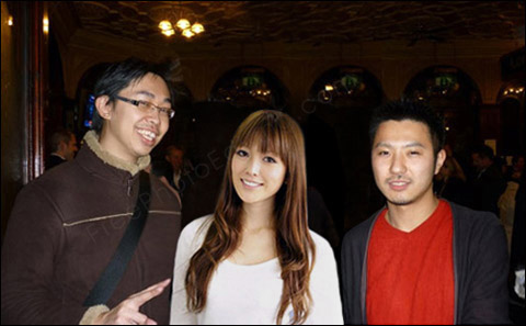 This is an edited photo in which the person in the middle has been added from another picture.
