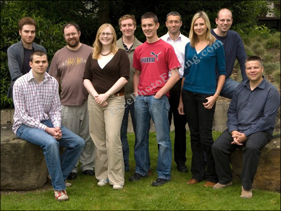 Photo editing example [Remove from group]: This is university group photograph in which one person who is not part of the team and needs to be removed.
