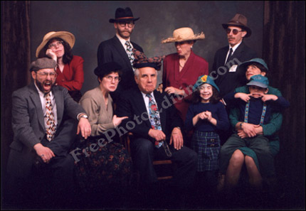 Photo editing example [Add to group]: This is a humour based family group photograph in which each person sports a comical expression. Only the family dog is missing and needs to be merged seamlessly into this happy group.