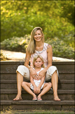 Photo editing: The second woman (seen in photo on left) has been removed from the photograph.  A portion of the steps, stream and greenery have been recreated to complete the picture. Touch-up has been done wherever required.
