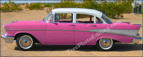 Light blue 1957 Chevrolet 210 converted to shocking pink with photo editing