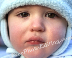 Photo editing: Retouching of tears on baby's face and in baby's eyes