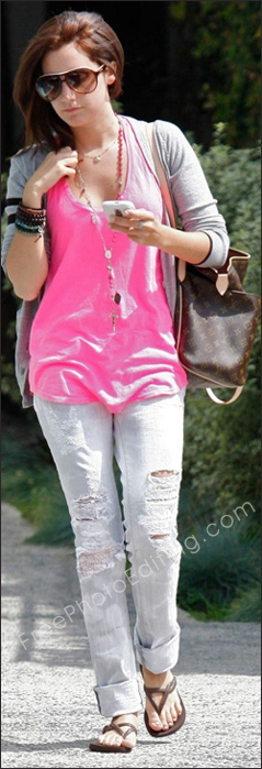 Tear in jeans has been fixed with photo retouching. The original photo before retouching can be seen on left.