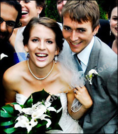 A happy-looking wedding party photograph