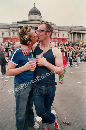 Gay couple kissing at London Gay Pride event. The couple want the background changed to a nature scene.