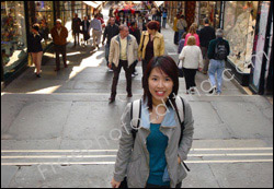 Photo editing required. The young woman in this photo wants to be placed in the patio photo seen on right.
