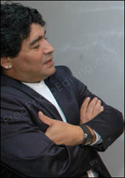 Photo edit required: This is a photo of Maradona that needs to be merged with John Abraham's pic and they both need to be placed on the beach, under the bridge ;). Maradona is 'accused' of being gay, mostly in jest. 