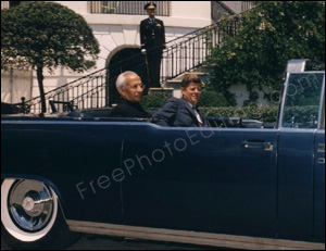 Photo editing required: This is a pic of President Kennedy seated in a limousine at the White House. Katie Holmes who is playing the role of Jacqueline Kennedy needs to be added to this picture