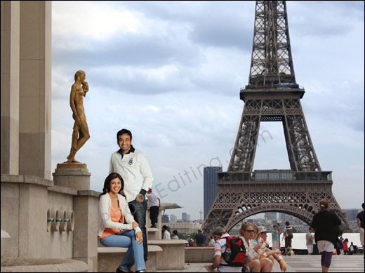 This is a photo editing example in which Shilpa Shetty and her husband Rak Kundra have been moved out of their drawing room and placed within the precincts of the Eiffel Tower.