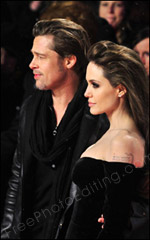 This photograph of Hollywood stars Brad Pitt and Angelina Jolie was taken at the European premiere of 'The Tourist' on December 14, 2010. Pitt and Jolie need to be extracted from this photo and set against the night sky on a beach. The retouched photo with changed background can be seen below.