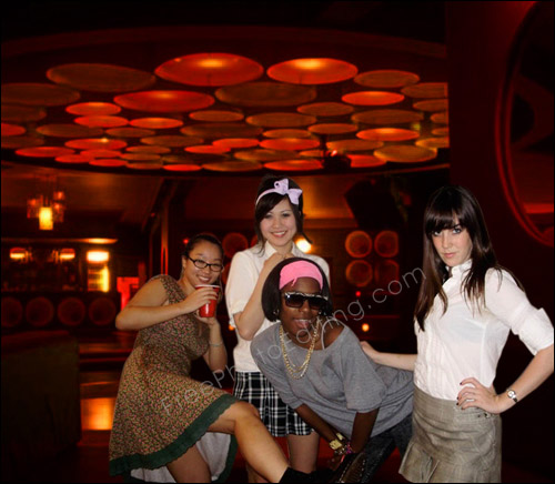The background of this photo has been changed to a discotheque scene.