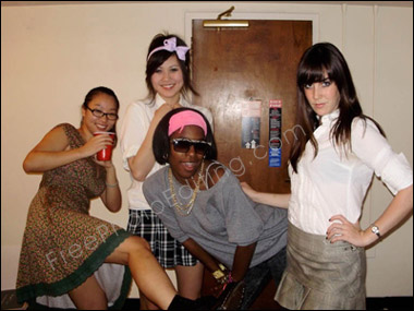 Photo background change required. The girls in this photo need to be placed in a disco. See edited photo below.