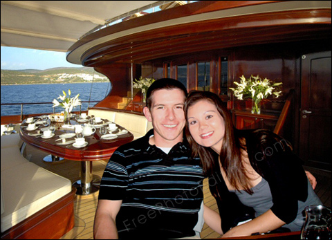 This is an edited photo in which the couple has been added to this luxury liner photo. The original photo can be seen above.