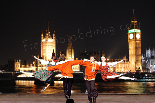 This is an edited photo in which a Russian dance group has been placed against a London scene by night.
