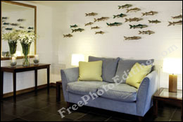 Living room done in beautiful pastels and unusual, contemporary decor.