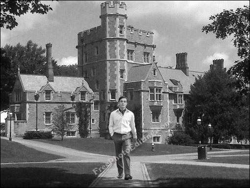 Merge two photos - Young man walking on street transposed in front of Princeton University building. (Photo converted to B&W)