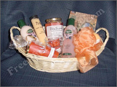 Photos before editing: This is a picture of a cosmetics gift basket shot against a cloth background. The client now wants this background removed and replaced with a plain mauve colour.