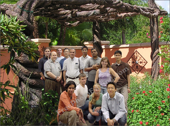 This is an edited photo in which the persons seen have been moved out of a lab and into this outdoor photo. Some augmentation in the foliage has been made to accommodate the changes (see the two pics above for comparison).