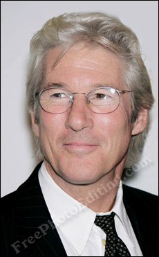 Richard Gere wearing bifocal glasses. Background in photograph has been removed.