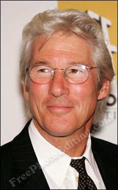 Hollywood actor Richard Gere at an event in suit & tie.