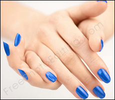This is a photo retouching example of nail-colour change. The original nail colour was red (see photo on left). It has been chnaged to blue after editing.