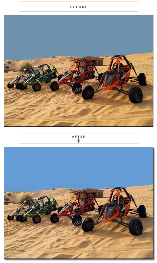 Sky colour has been corrected in this photo showing four dune buggies inthe desert