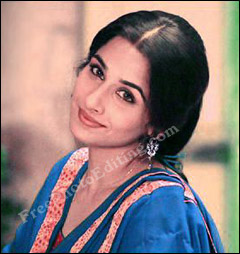 Bollywood star Vidya Balan's photo overcast with yellow, restored to natural colours.