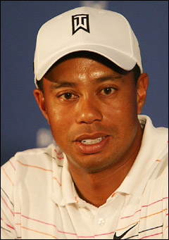Good photo of Tiger Woods except that there is a yellow colour hue running over it