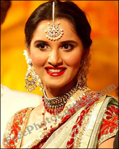 This is an April 25, 2010 photo of Indian tennis star, Sania Mirza at her wedding reception in Sialkot, Pakistan. The photograph was probably taken in coloured lighting conditions, casting a terrible orange hue all over the pic. This needs to be colour corrected with image editing.