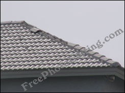 Roof tiles damaged by extreme weather conditions