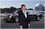 Photo editing: Simon Powell poses with the U.S. presidential Cadillac One.