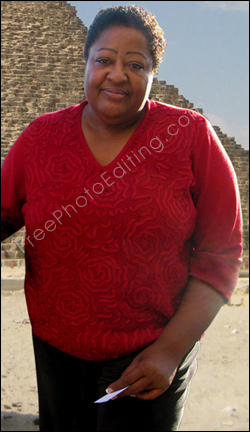 The woman in this photo wants to lose weight. She also want to look a little younger and she wants her expression changed to something more cheerful. The photo after editing can be seen on right.