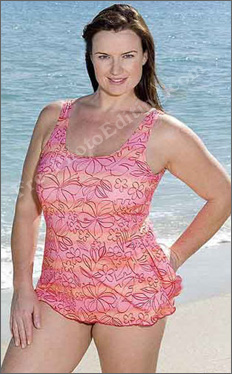 Big-built, heavy set woman in swimsuit on the beach, wishing she could look thin.