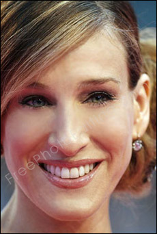 This is a photo editing example in which 'Sex and the City' TV series actress, Sarah Jessica Parker has been digitally retouched to look younger. Lines on the forehead have been removed. Wrinkles under the lines have been touched up. 