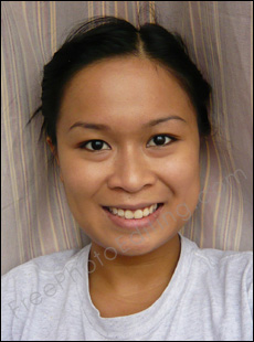 Virtual makeover required: This is a photo of a plain looking woman, wanting to be transformed to a perfect looking model with hot looks and high fashion quotient. See photo on right for makeover results.