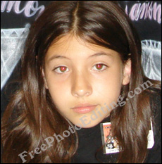 Little girl's photograph with red eye problem