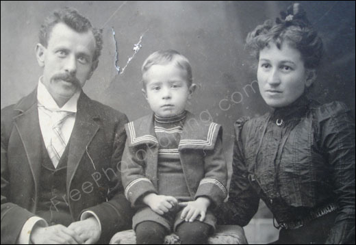 Photo touch-up requirement: This is an old photo, probably from the 1920s, that is creased, torn and damaged. It needs to be repaired and restored with photo editing.