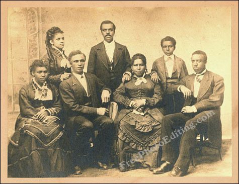 Very old family photograph that is terribly discoloured.