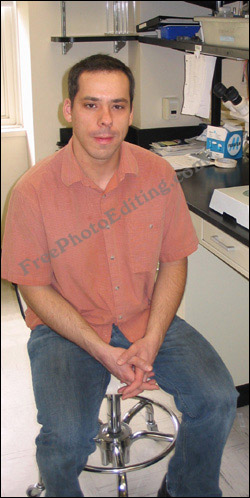 This is an edited photo of a man with squinchy eyes. The condition has been corrected with photo editing. There is a plastic surgery solution solution to this problem called 'Blepharoplasty'.
