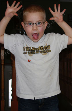 This is a photo editing example in which a little boy's cross-eyed look has been edited to look 'normal'.