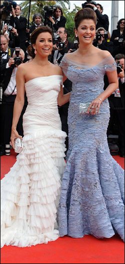 Photo editing required: This is photo of Aishwarya Rai walking the red carpet with Eva Longoria at the Robin Hood premiere at the Cannes Film Festival on May 12, 2010. Note Aishwarya's super-high hairstyle that needs to be altered with photo editing.